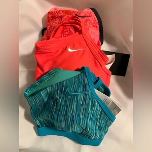 Nike swim tops or jog bra.  Size small.  No tags but never worn.